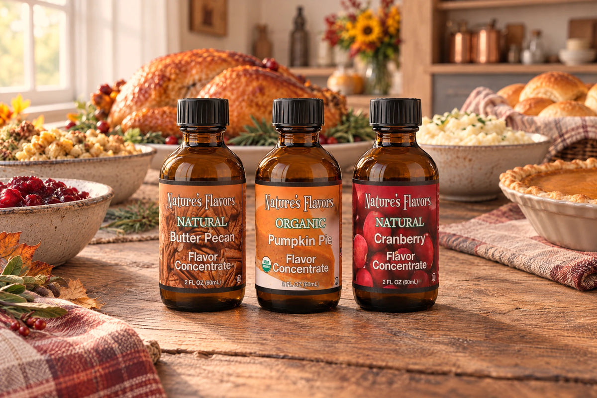Nature’s Flavors Pumpkin Pie, Butter Pecan, and Cranberry concentrate bottles on a wooden table with a Thanksgiving feast in a rustic kitchen.